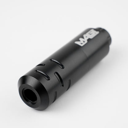 Close-up of black MAGI rotary tattoo pen machine with ergonomic grip design, lightweight body, and professional tattoo equipment build.