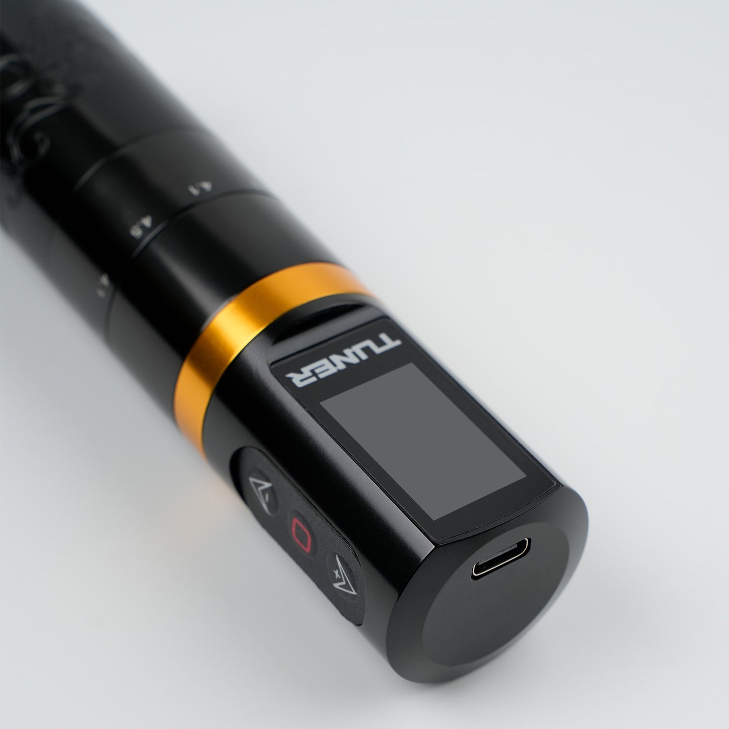 Dragoart Tuner wireless tattoo machine with digital display, control buttons, and USB-C charging port for professional tattooing